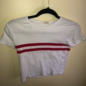 Brandy Melville White tee- with two red stripes.